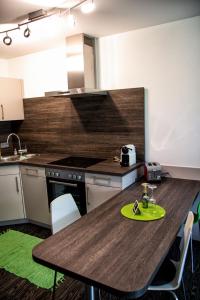Küche/Küchenzeile in der Unterkunft Hewen Apartments