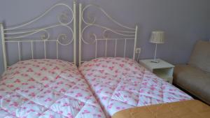 Postel nebo postele na pokoji v ubytování Shambala Apartments
