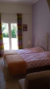 Postel nebo postele na pokoji v ubytování Shambala Apartments