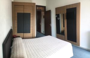 Postel nebo postele na pokoji v ubytování Albergo Valle d'Oro