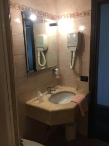 Koupelna v ubytování Albergo Valle d'Oro