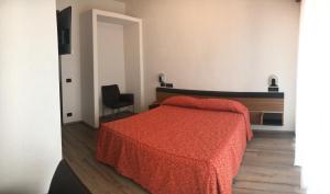 Postel nebo postele na pokoji v ubytování Albergo Valle d'Oro