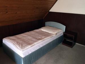 Postel nebo postele na pokoji v ubytování Tahiti Vendégpark + 28 fotografií