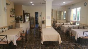 Restaurace v ubytování Hotel ILLI + 18 fotografií