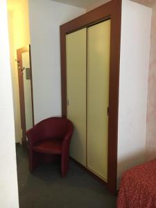Postel nebo postele na pokoji v ubytování Albergo Valle d'Oro
