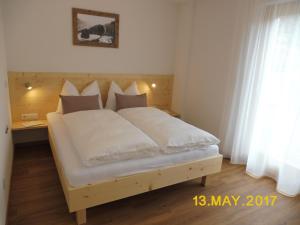 Postel nebo postele na pokoji v ubytování Leitnerhof