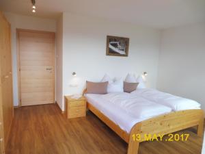 A bed or beds in a room at Leitnerhof