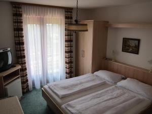 Tempat tidur dalam kamar di Haus Kaiser