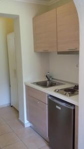 Kuchyň nebo kuchyňský kout v ubytování Shambala Apartments