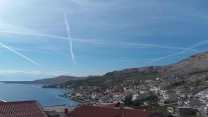 a view of a city and a body of water at LARA & VITO in Metajna