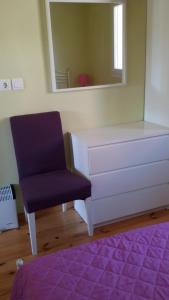 Postel nebo postele na pokoji v ubytování Shambala Apartments