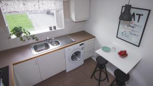 Kuchyň nebo kuchyňský kout v ubytování Apartment 19