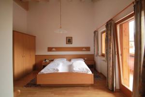 Letto o letti in una camera di Pension Merisana