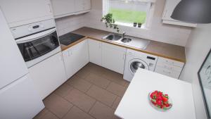 Kuchyň nebo kuchyňský kout v ubytování Apartment 19
