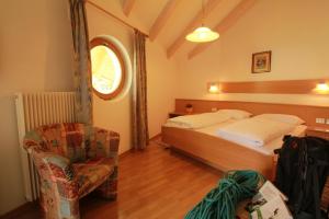 Letto o letti in una camera di Pension Merisana