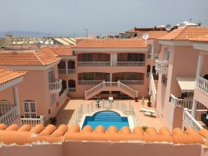 an aerial view of a large house with a swimming pool at Superior Apartment with Ocean View in Callao Salvaje