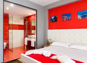 Posteľ alebo postele v izbe v ubytovaní Lagaria Hotel