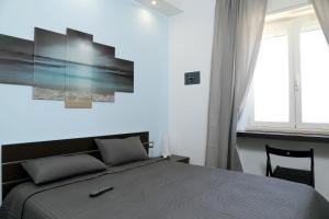 Ліжко або ліжка в номері Rooms La Perla Del Mare