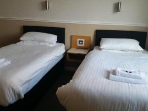 Krevet ili kreveti u jedinici u okviru objekta The Bridge Hotel