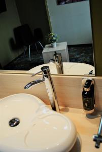 Koupelna v ubytování Kongres Hotel Roca