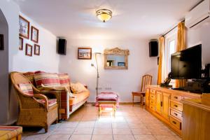 A television and/or entertainment centre at Casa Charlotte