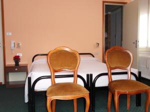 Postel nebo postele na pokoji v ubytování Albergo Betulla + 4 fotografie