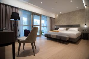 Posteľ alebo postele v izbe v ubytovaní Athenaeum Grand Hotel + 37 fotografií