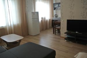 TV a/nebo společenská místnost v ubytování Piramida Apartments