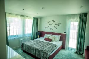 Voodi või voodid majutusasutuse Hotel Hedonic toas