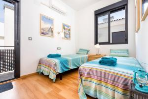 Posteľ alebo postele v izbe v ubytovaní Jinetes Penthouse in Malaga by Solaga Holiday Homes