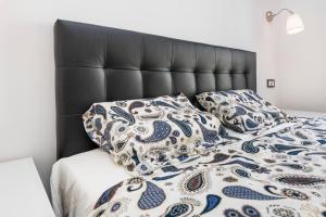Posteľ alebo postele v izbe v ubytovaní Jinetes Penthouse in Malaga by Solaga Holiday Homes