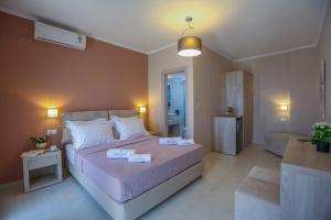 Ένα ή περισσότερα κρεβάτια σε δωμάτιο στο Petani Resort