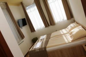 Letto o letti in una camera di Hotel Logavina 8 Garage Parking