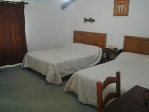 Cama o camas de una habitación en Le Ranfort Chambres d'Hôtes