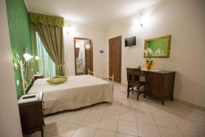 Postel nebo postele na pokoji v ubytování B&B Le due gioie