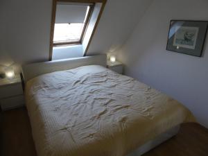 Postel nebo postele na pokoji v ubytování Ostseeferienwohnung Storchennest