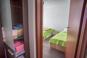 Postelja oz. postelje v sobi nastanitve Apartmani Restoran Durmitor