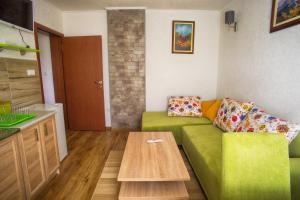 Predel za sedenje v nastanitvi Apartmani Restoran Durmitor