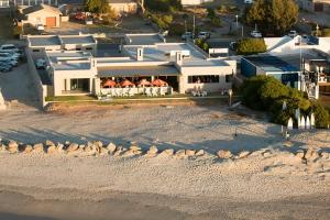 an aerial view of a house on the beach at Beach Breakaway Apartment in Langebaan