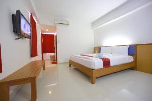 Łóżko lub łóżka w pokoju w obiekcie J2 Hotel Maesot