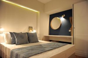Posteľ alebo postele v izbe v ubytovaní Evangelia Rooms & Αpartments - B