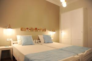 Posteľ alebo postele v izbe v ubytovaní Evangelia Rooms & Αpartments - B