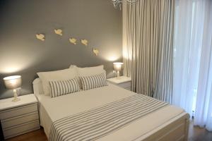 Posteľ alebo postele v izbe v ubytovaní Evangelia Rooms & Αpartments - B