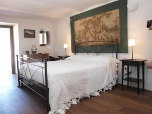 Tenuta Corigliano tesisinde bir odada yatak veya yataklar