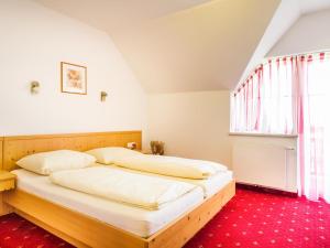 Postel nebo postele na pokoji v ubytování Landhof Steinbäck
