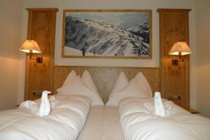 Katil atau katil-katil dalam bilik di Alpen Appartements Zauchensee