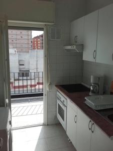 Kuchyň nebo kuchyňský kout v ubytování Torrenostra Apartment