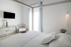 Postel nebo postele na pokoji v ubytování Hotel Es Marès