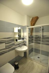 a bathroom with a sink and a shower at La casa di Michela in Termoli