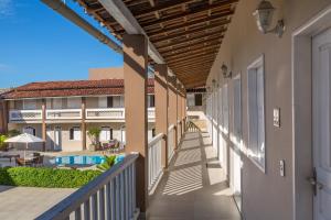 a view of the balcony of a resort at Pousada Jangadeiro in Porto Seguro